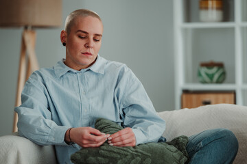 Woman experiencing sadness and deep contemplation at home