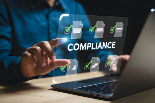 Businessman interacting with digital compliance checklist on futuristic interface concept of regulation and approval for business.