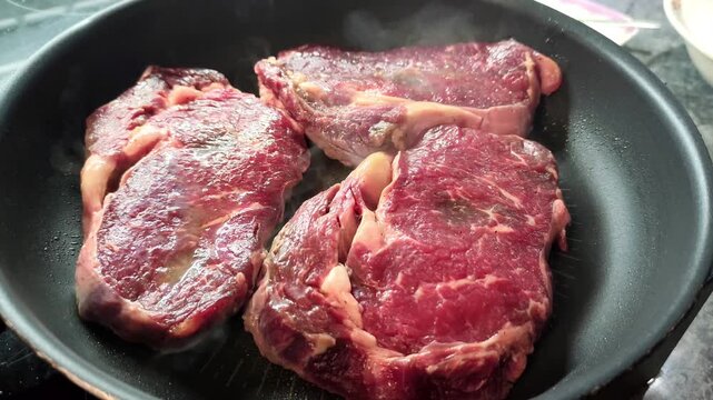 Beef stake frying on the pan .High quality 