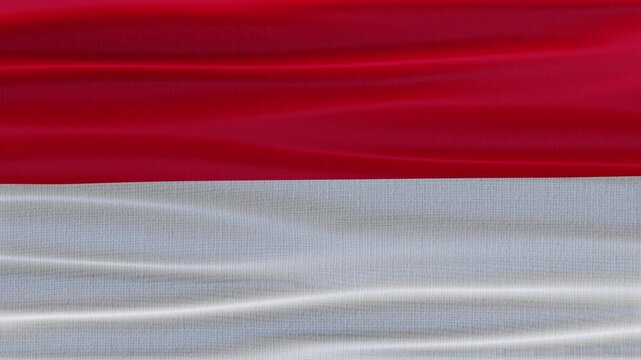 Indonesia flag waving in the wind with high quality fabric texture