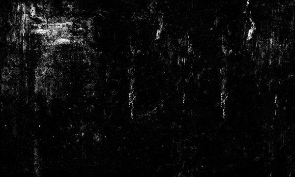 Abstract grungy texture background featuring intense black color with scattered white noise dust scratches film