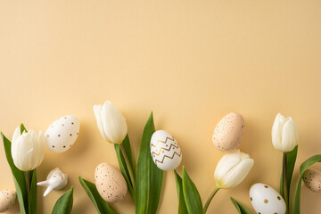Fototapeta premium Happy Easter flat lay featuring a white tulip and decorated egg on a soft pastel background evoking spring warmth and gentle seasonal celebration