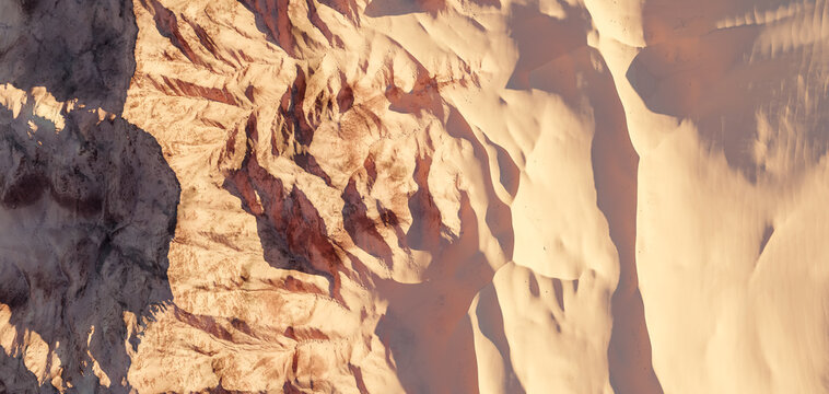 Aerial Desert Sand Dunes And Rocky Canyon Terrain In Warm Light 3D Rendering