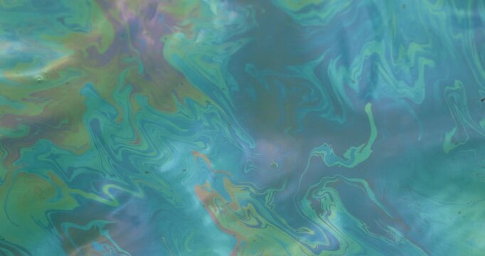 colorful oil slick texture on water surface