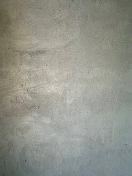 Apartment renovation. Fresh floor screed as background, closeup