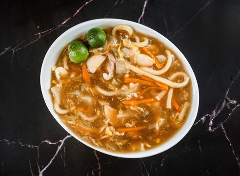 A warm and thick noodle soup with vegetables and meat perfect for comfort food