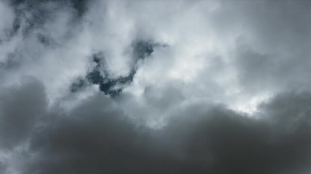 Time lapse of white clouds against a blue sky. Occasionally, there are small clouds in the sky. . 4K video	
