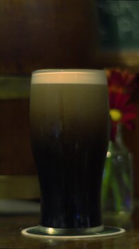 Stout Porter black beer settling in pint glass Ireland drink