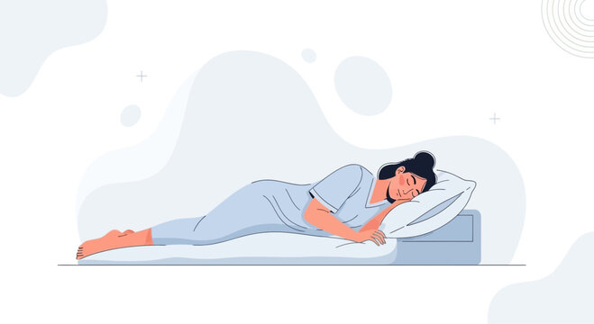 Woman sleeping peacefully on her side on a comfortable mattress and pillow