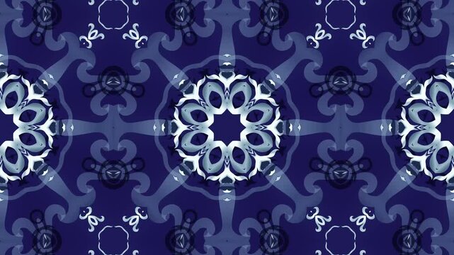 Abstract blue floral kaleidoscope motion animation background. mandala symmetrical.