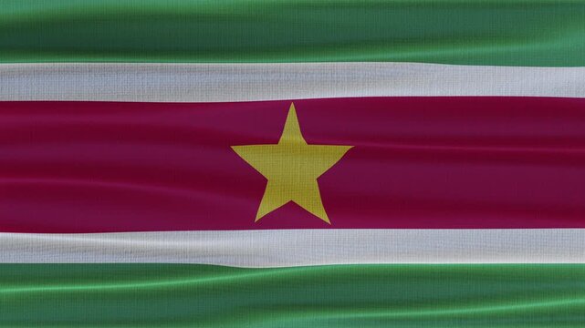 Suriname flag waving in the wind with high quality fabric texture