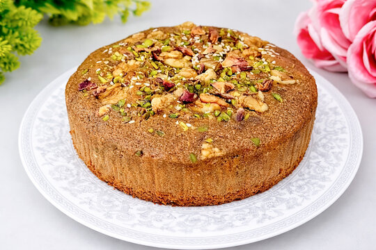 Delicious homemade dry fruit cake with nuts on plate