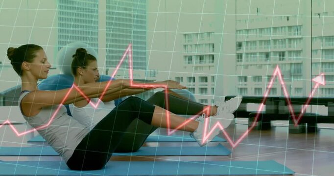 Three exercisers holding V-sit pulsing legs on mats in fitness studio, grid appearing ECG animating