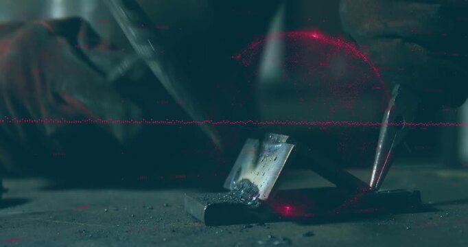 Welder bringing electrode down on joint, striking arc and forming molten pool for metal fabrication