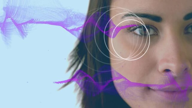 Woman sliding in, white rings aligning on cheek while purple ribbon undulating, creating design art