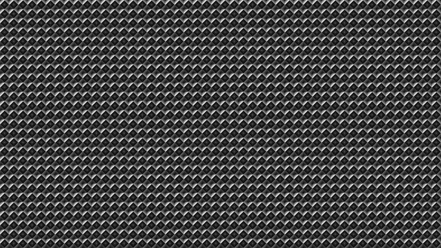 Close-up of a dark woven carbon fiber surface showing a repeating textured pattern, ideal for backgrounds, industrial design, or modern material concepts.