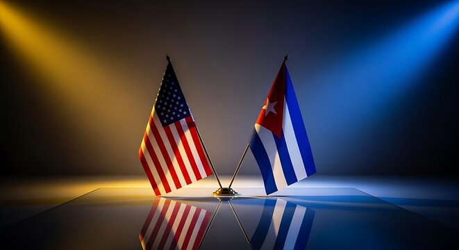 United States and Cuba flags displayed side-by-side with dramatic lighting and reflections