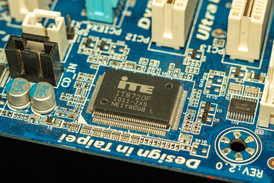 A detailed electronic circuit board with microchip and connectors for computer technology development
