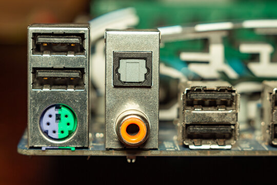 A detailed view of computer back panel ports and connectors for data transfer