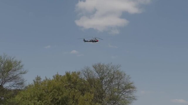 3D modeling animation of a helicopter captured by a cinematic camera.