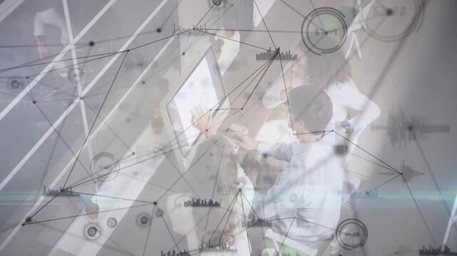 Vertical video: Data team leaning at screen, mouse input sparking nodes overlay for tech review