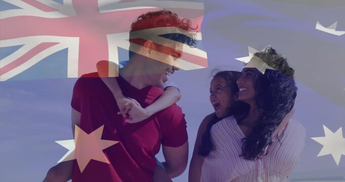 Family walking beach, man carrying boy on back sparking travel smiles, flag overlay drifting fading