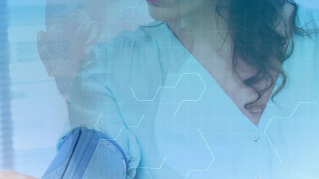 Nurse checking blood pressure on woman wearing blue blouse after cuff fit at clinic, hex overlay