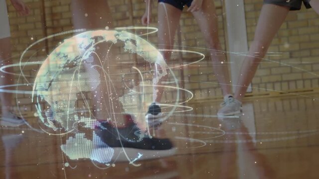 Teen basketball players pivoting, dribbling on ball appearing, beating guards, holo globe pulsing