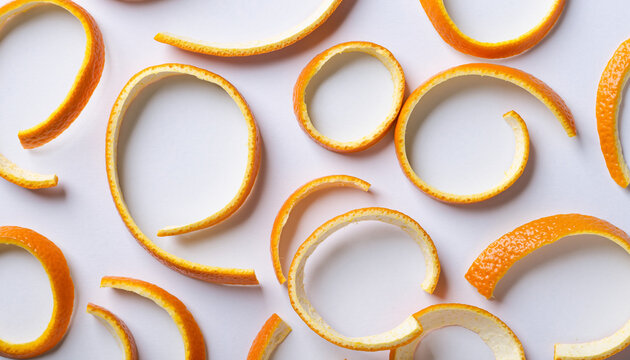 Abstract Orange and Yellow Circular Bangles Scattered.