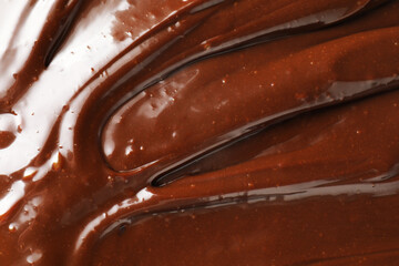 Texture of tasty melted chocolate as background, top view