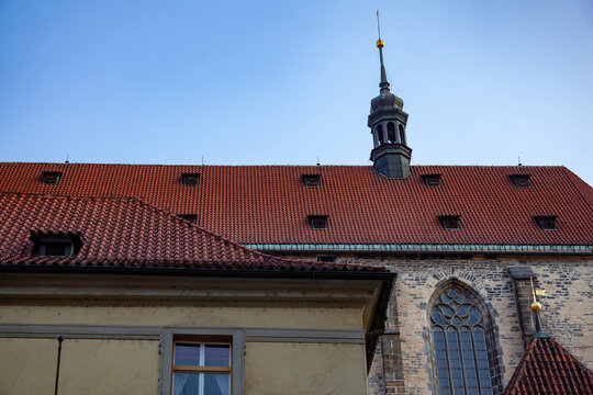 European rooftop and historic church