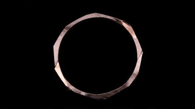 Rose Gold Faceted Metal Bracelet on Black Background Luxury Jewelry