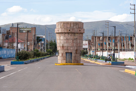Juliaca, Puno, Peru - February 2, 2026 - Replica of the Sillustani Funerary Tower (Chullpa) on Aviaci&oacute;n Avenue