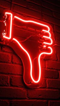 Red neon thumbs down sign glowing on a brick wall background