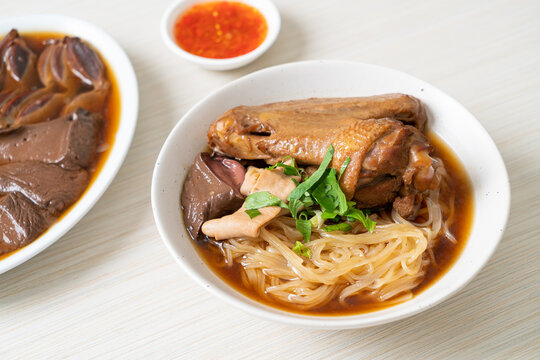 Braised duck noodles with brown soup