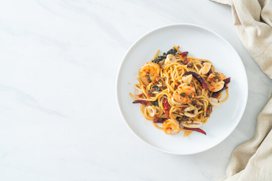 spicy spaghetti seafood on plate