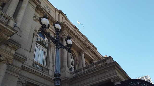 Architecture of Colon Theater Opera house in Argentina with National Flag, Skyline in Buenos Aires city, famous Culture building