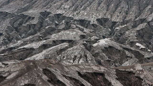 Wide shot of Volcanic Erosion Gullies on Mount Bromo Slopes, Bromo Tengger Semeru National Park, East Java Indonesia