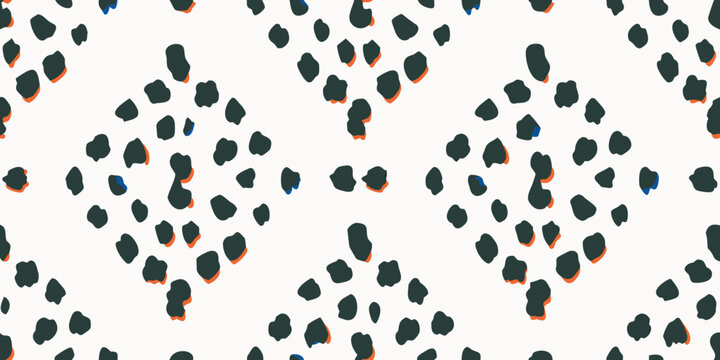 Abstract pattern of dark spots and coral accents on a light background