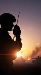 Fototapeta premium Military Silhouette Communication at Sunset with Tanks in Background
