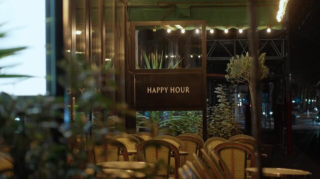 Happy Hour sign in a Vintage Restaurant at night, Paris France, Europe