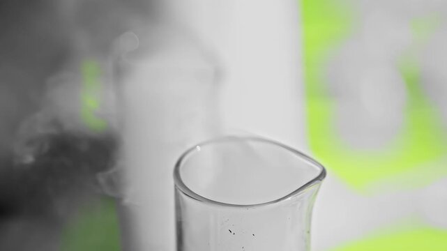 Close up view on a smoking laboratory test tube.