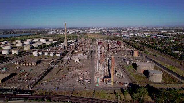 Decommissioned oil refinery aerial sunny day, Altona, Australia