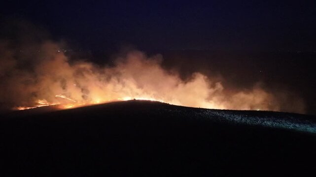 wildfire in the mountains in the sampson community near boone nc, north carolina