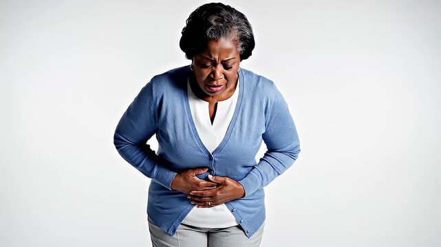 Senior Woman Suffering from Severe Abdominal Pain