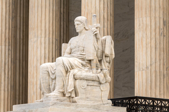 Authority of Law symbolic monument. Supreme court architecture neoclassical heritage. Law lex constitution judicial power. Historic justice statue.