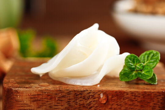 Fresh White Jade Ear Fungus from Changbai Mountain Northeast China with Mint on Wooden Board