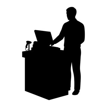 Silhouette of a male cashier working at a retail store checkout counter with computer