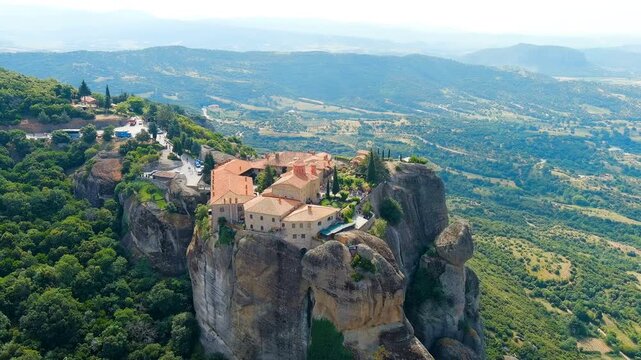 Meteora, Kalabaka, Greece. Monastery of St. Stephan. Meteora - rocks, up to 600 meters high. There are 6 active Greek Orthodox monasteries listed on the UNESCO list. Drone footage