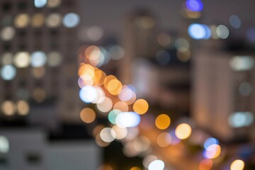 Fototapeta premium A blurry image of a city street at night_6